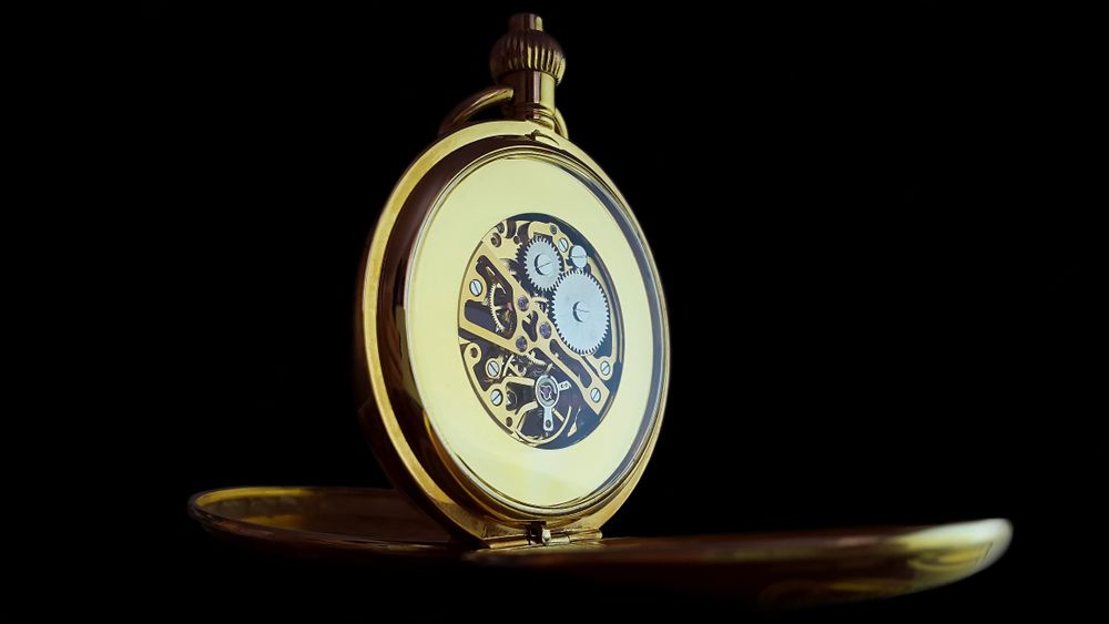 Movement of an antique pocket watch — we buy them running or not