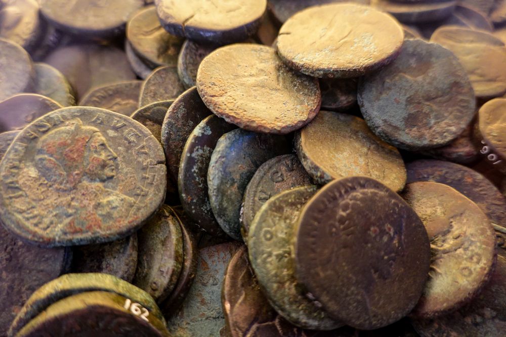 Inherited gold coin collection sorted by grade and metal