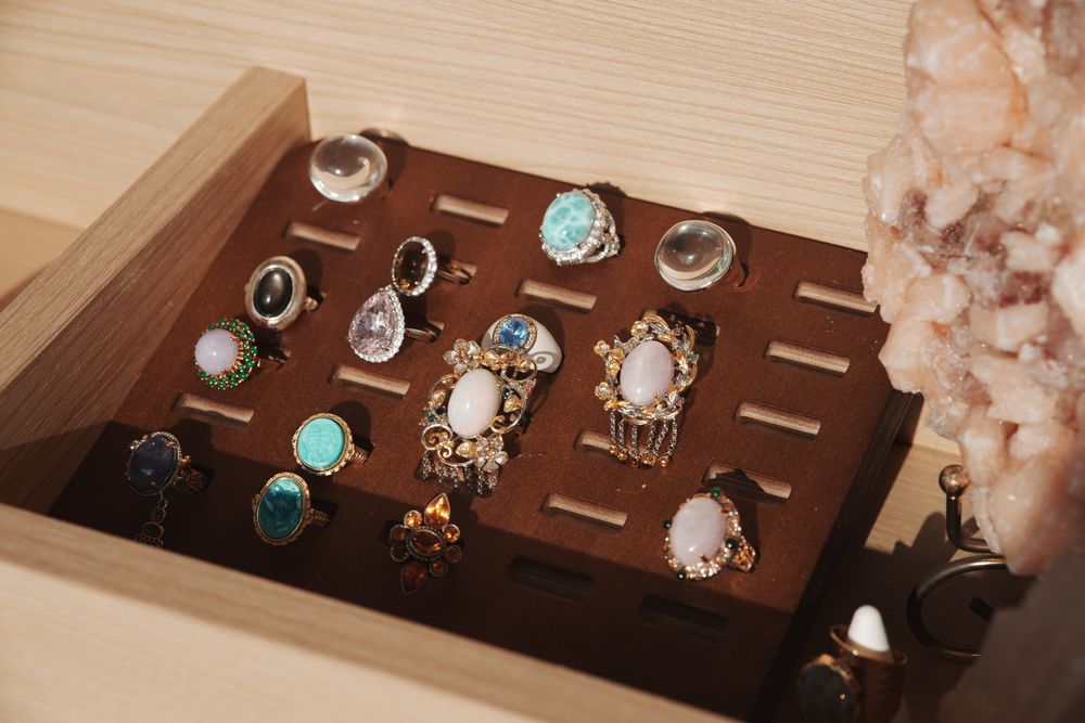 Vintage gemstone ring examined under a jeweler's loupe